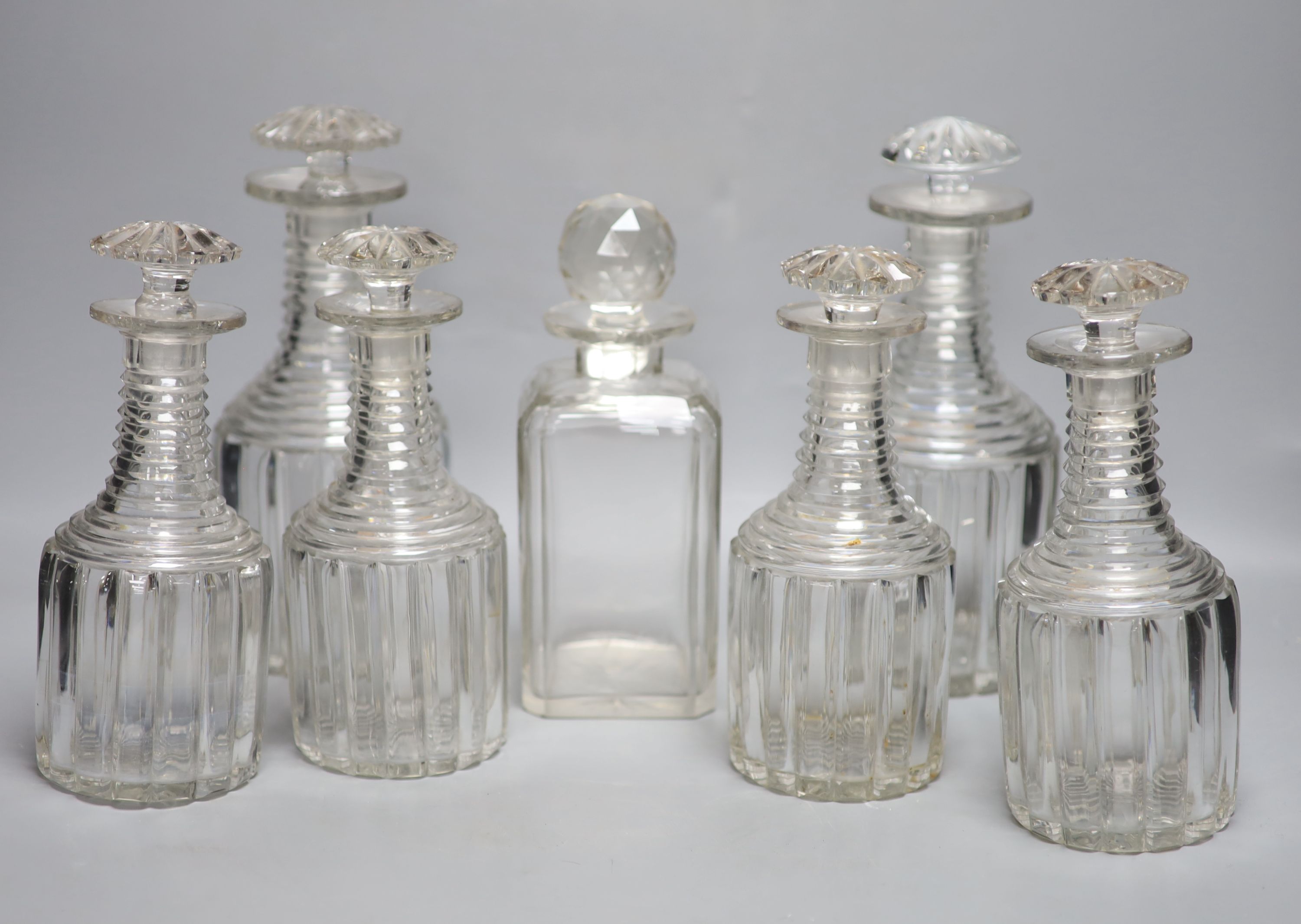 A set of four glass decanters, a matching pair and another, 25cm